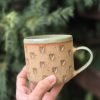 Ceramic mug with hearts
