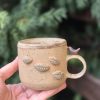 Ceramic mug with bird